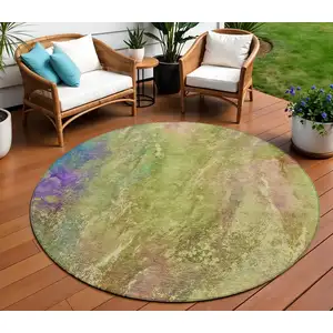 Photo of 8' Green Pink And Blue Round Abstract Washable Indoor Outdoor Area Rug