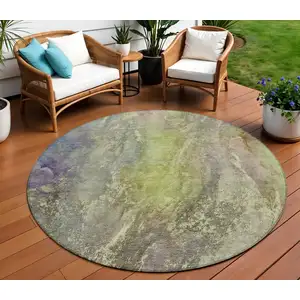 Photo of 8' Green Pink And Gold Round Abstract Washable Indoor Outdoor Area Rug