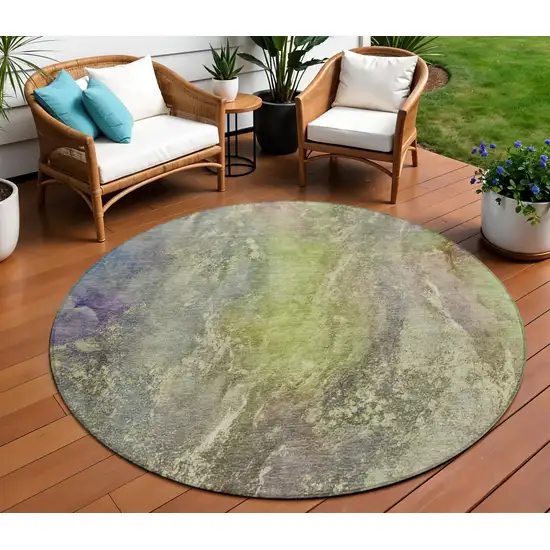 8' Green Pink And Gold Round Abstract Washable Indoor Outdoor Area Rug Photo 1