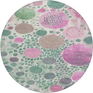 Photo of 8' Green Pink And Mauve Round Geometric Washable Indoor Outdoor Area Rug