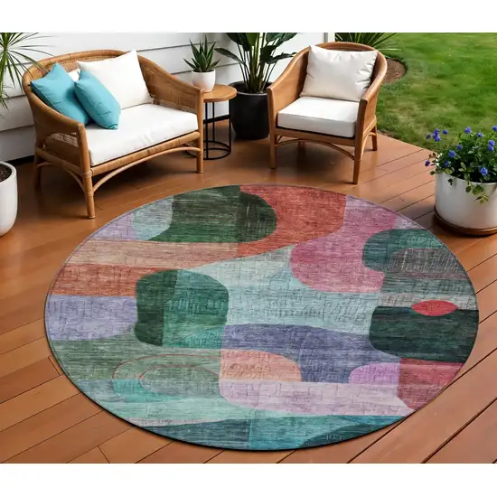 8' Green Purple And Blue Round Abstract Washable Indoor Outdoor Area Rug Photo 1