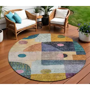 Photo of 8' Green Purple And Blue Round Geometric Washable Indoor Outdoor Area Rug