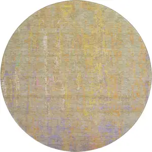 Photo of 8' Green Purple And Gold Abstract Washable Round Rug With UV Protection