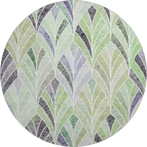 Photo of 8' Green Purple And Ivory Geometric Washable Round Rug With UV Protection