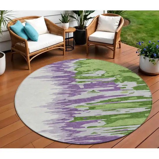 8' Green Purple And Ivory Round Abstract Washable Indoor Outdoor Area Rug Photo 1