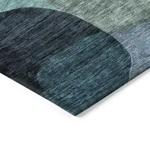 Photo of 8' Green Purple And Pink Round Abstract Washable Indoor Outdoor Area Rug
