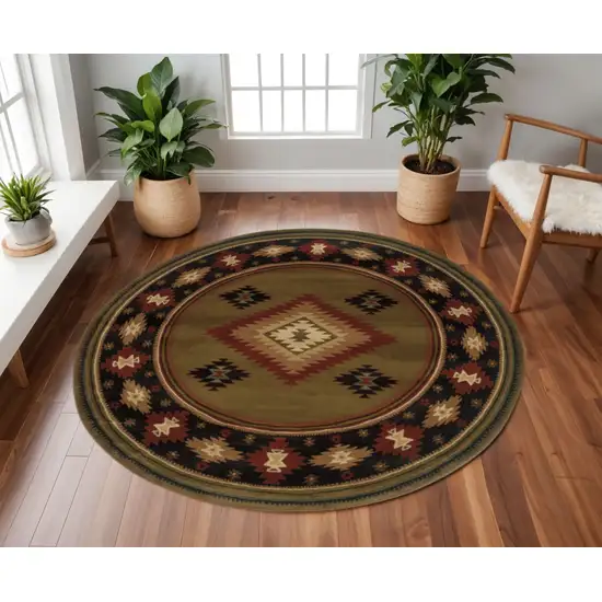 8' Green Round Southwestern Power Loom Stain Resistant Area Rug Photo 1