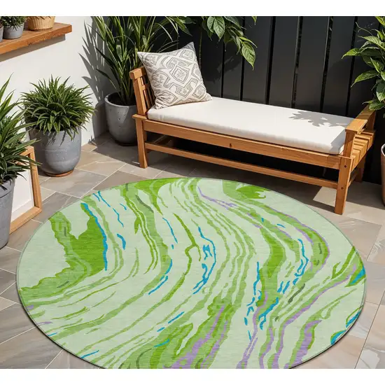 8' Green Teal Blue And Purple Round Abstract Washable Indoor Outdoor Area Rug Photo 1