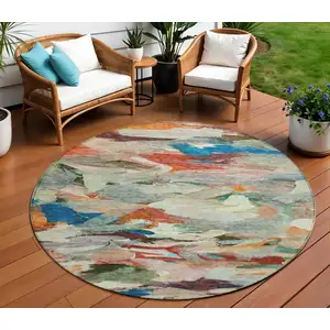 Photo of 8' Green Teal Blue And Terra Cotta Round Abstract Washable Indoor Outdoor Area Rug
