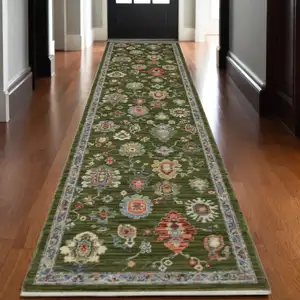 Photo of 12' Green Yellow And Ivory Oriental Runner Rug With Fringe