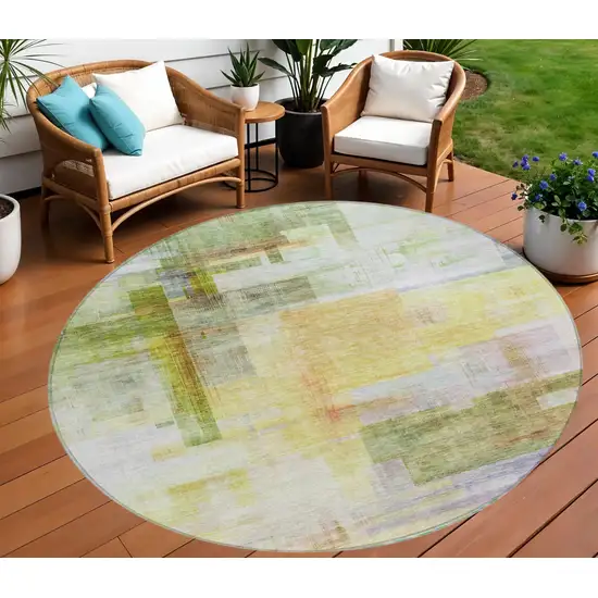 8' Green Yellow And Purple Round Abstract Washable Indoor Outdoor Area Rug Photo 1