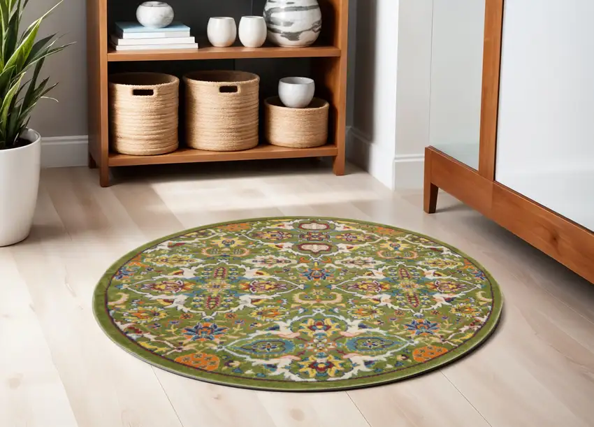 4' Green Yellow Blue and Red Round Floral Power Loom Area Rug Photo 1