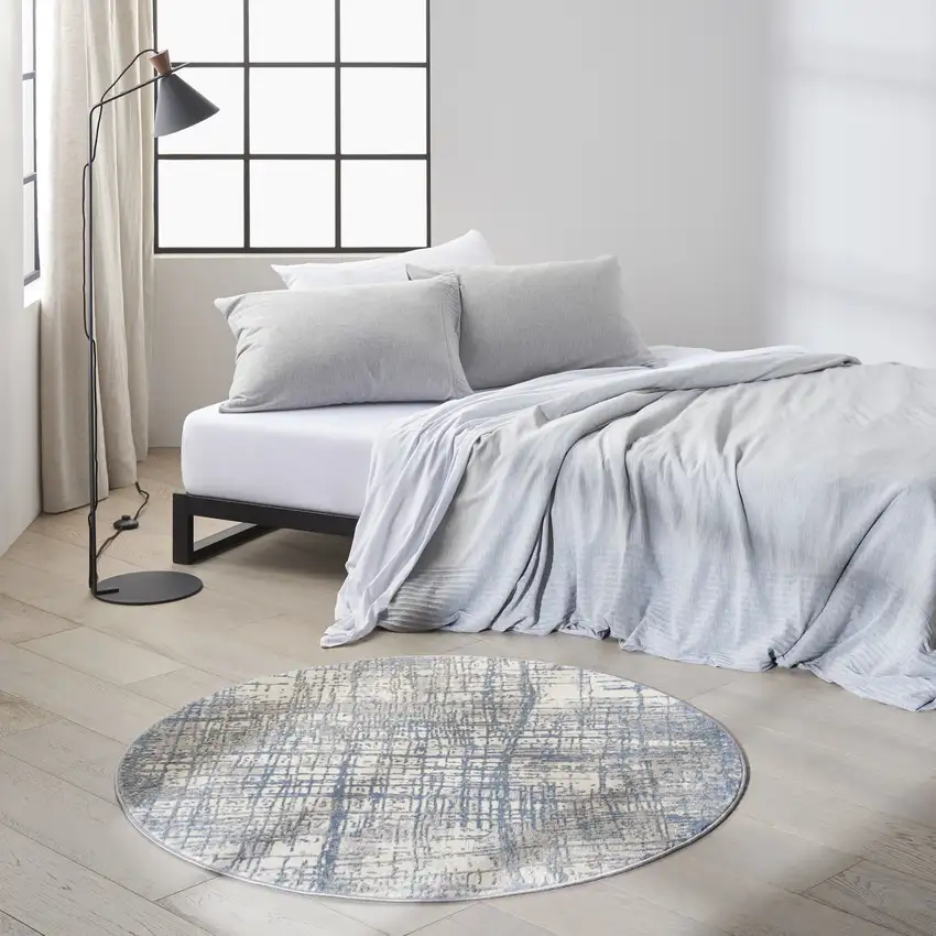 4' Ivory Abstract Power Loom Round Rug Photo 5