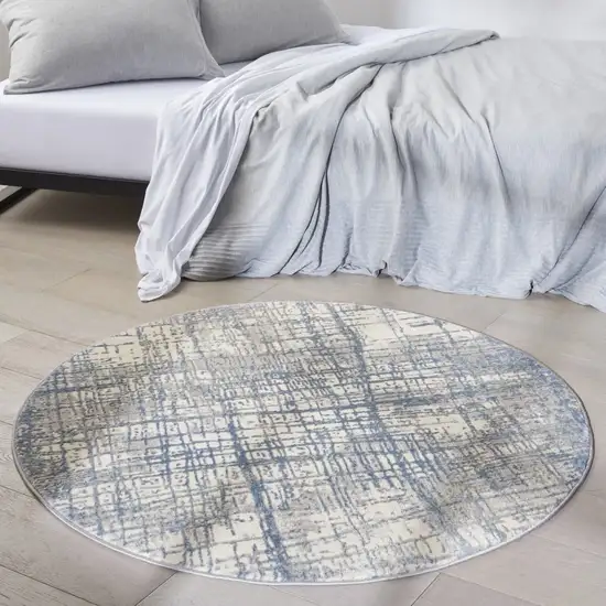 4' Ivory Abstract Power Loom Round Rug Photo 6