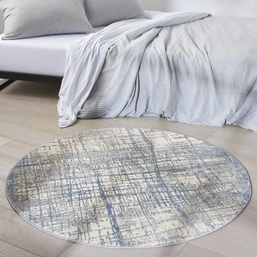 4' Ivory Abstract Power Loom Round Rug Photo 6