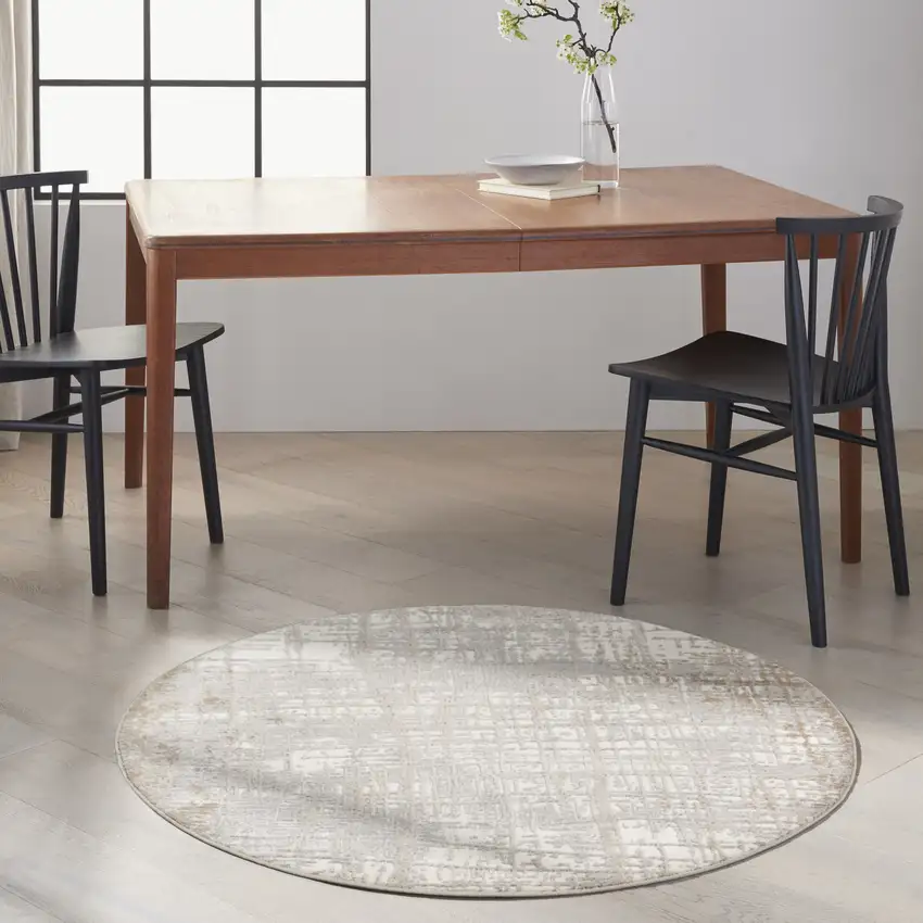 4' Ivory Abstract Power Loom Round Rug Photo 5