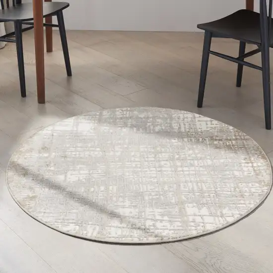 4' Ivory Abstract Power Loom Round Rug Photo 6