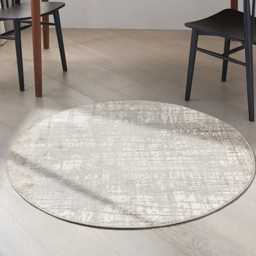 4' Ivory Abstract Power Loom Round Rug Photo 6