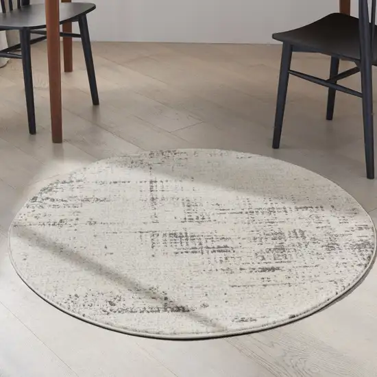 4' Ivory Abstract Power Loom Round Rug Photo 6