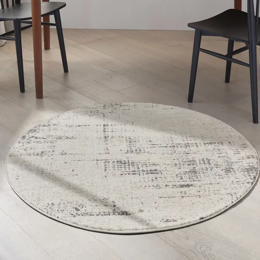 4' Ivory Abstract Power Loom Round Rug Photo 6