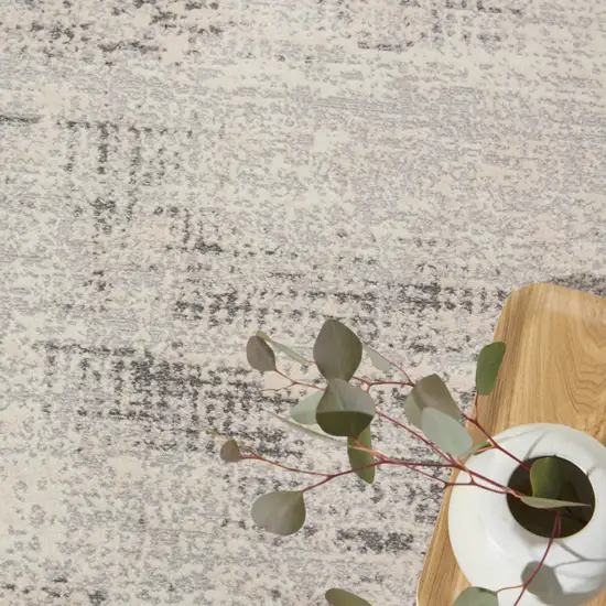 4' Ivory Abstract Power Loom Round Rug Photo 9