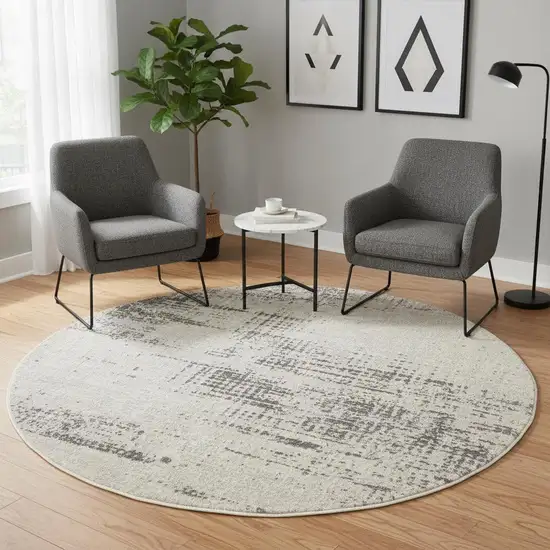 6' Ivory Abstract Power Loom Round Rug Photo 1