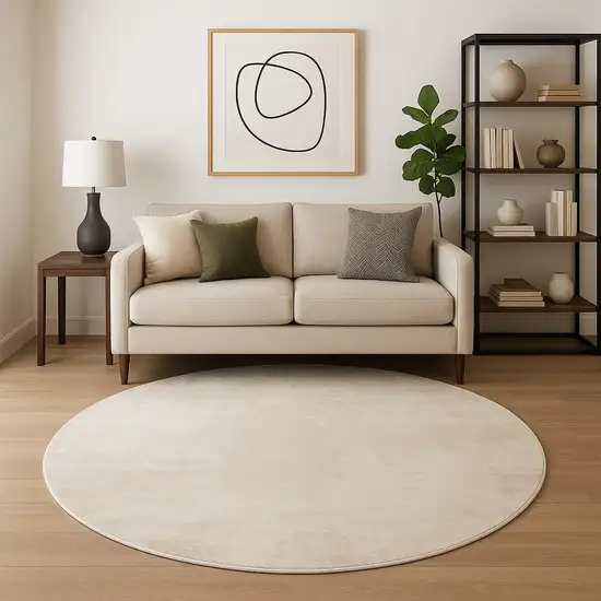 8' Ivory Abstract Round Rug Photo 1