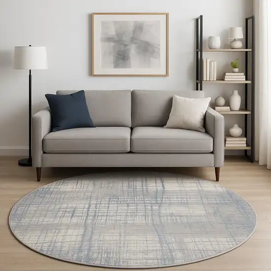 8' Ivory Abstract Round Rug Photo 1