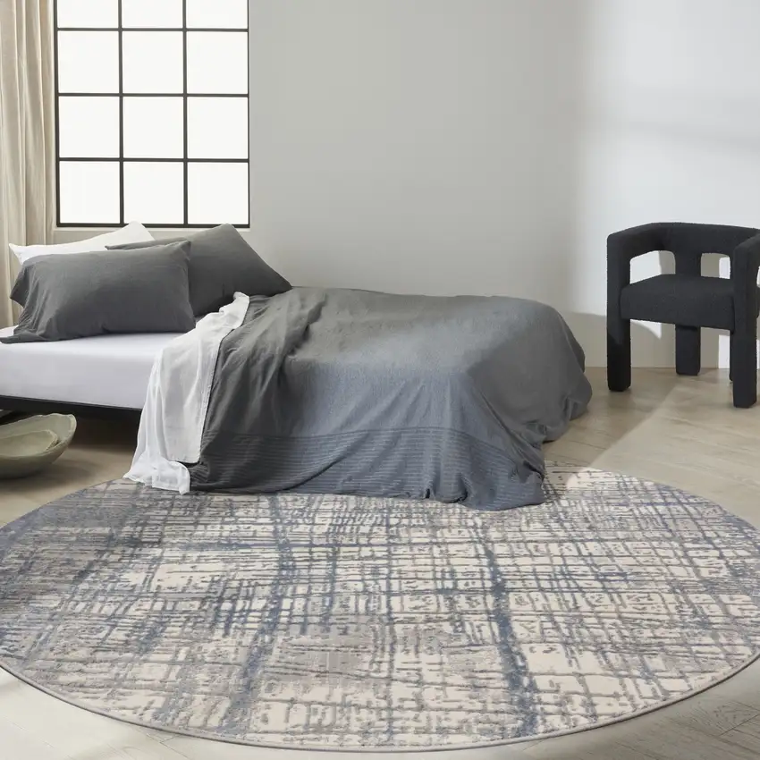 8' Ivory Abstract Round Rug Photo 5