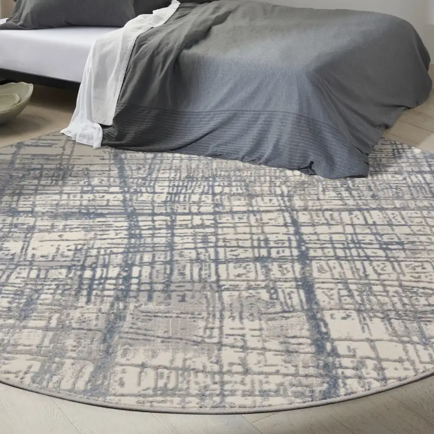 8' Ivory Abstract Round Rug Photo 6