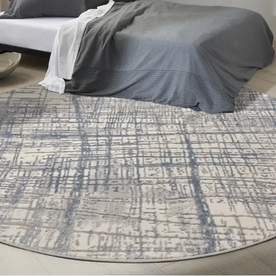 8' Ivory Abstract Round Rug Photo 6
