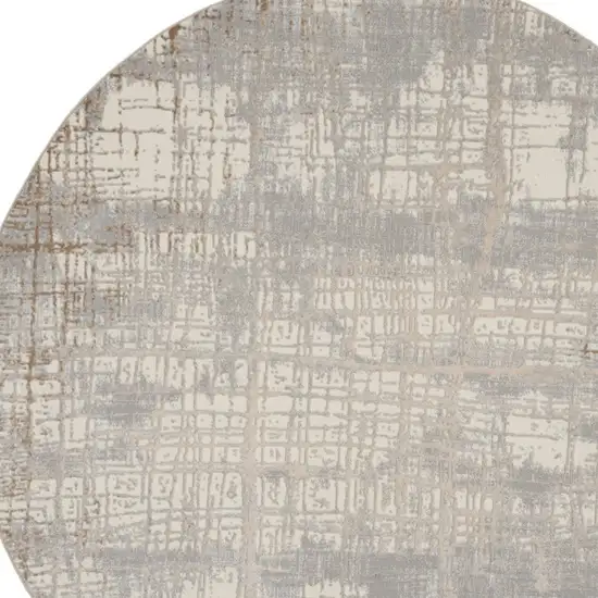 8' Ivory Abstract Round Rug Photo 9