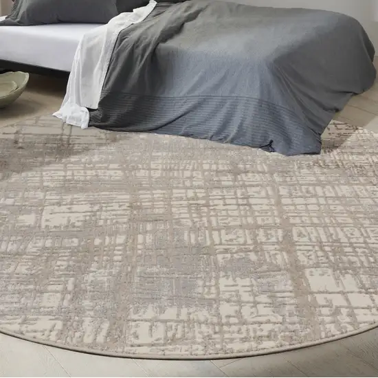 8' Ivory Abstract Round Rug Photo 5