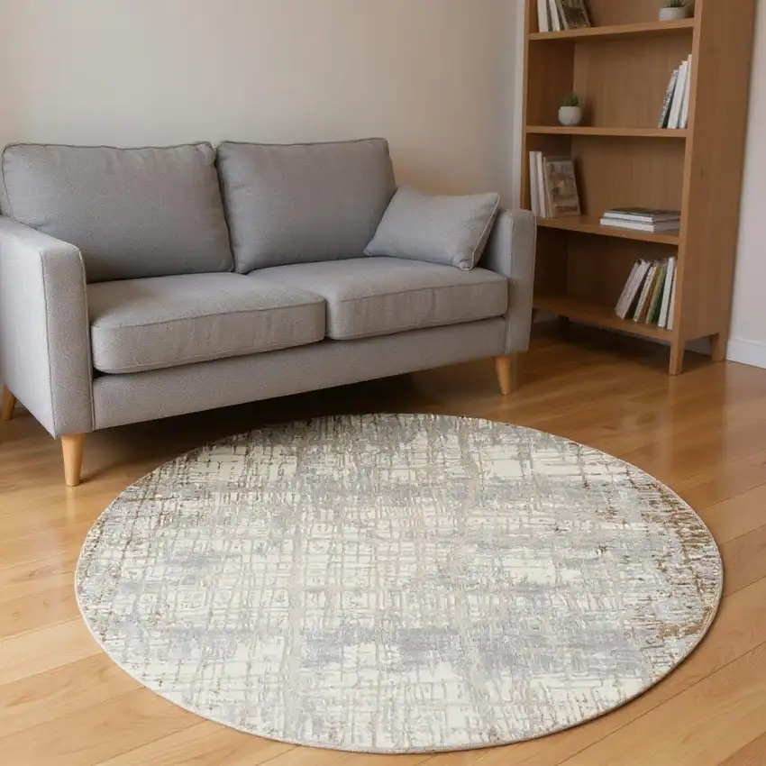 8' Ivory Abstract Round Rug Photo 1