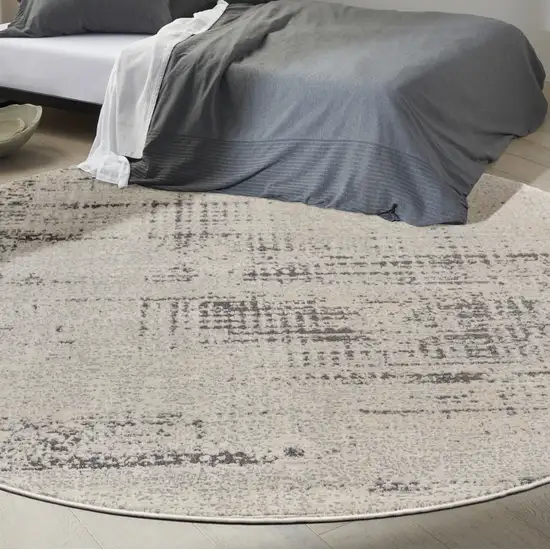 8' Ivory Abstract Round Rug Photo 5