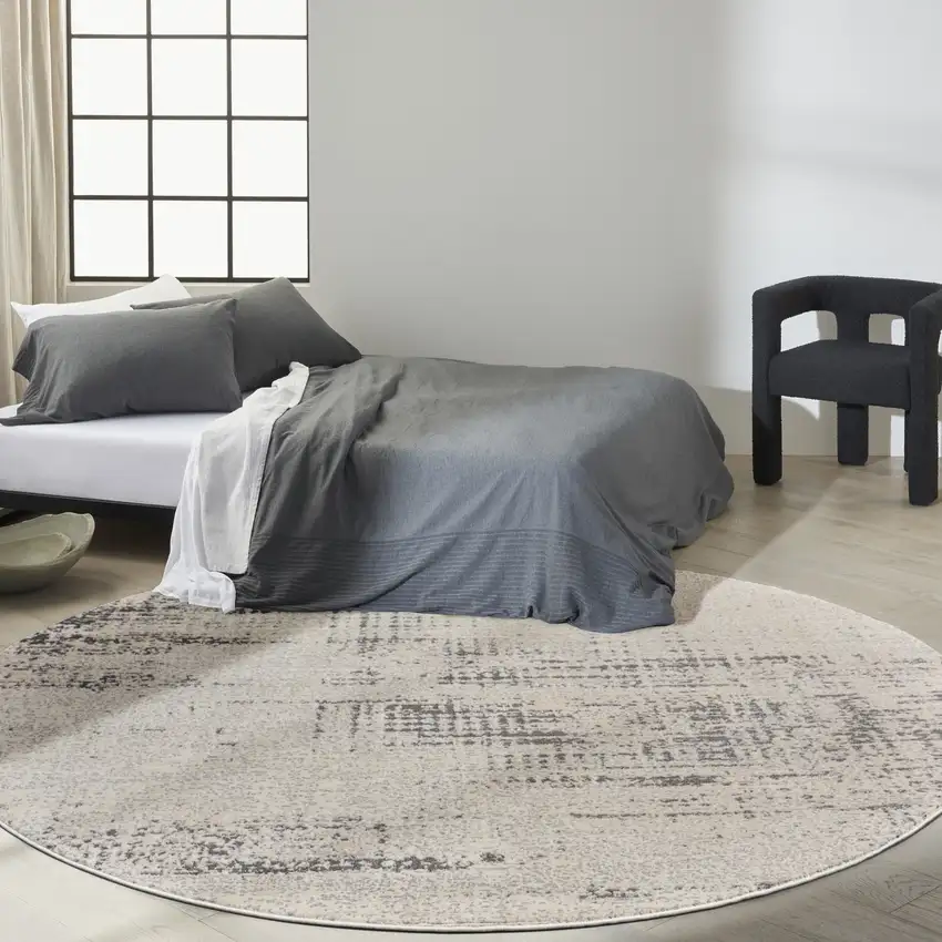 8' Ivory Abstract Round Rug Photo 6