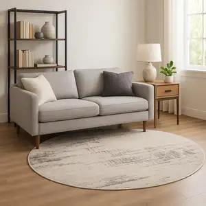 Photo of 8' Ivory Abstract Round Rug