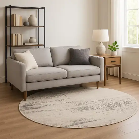 8' Ivory Abstract Round Rug Photo 1
