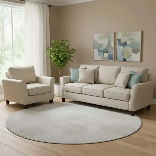 8' Ivory And Beige Abstract Geometric Washable Round Rug With UV Protection Photo 1