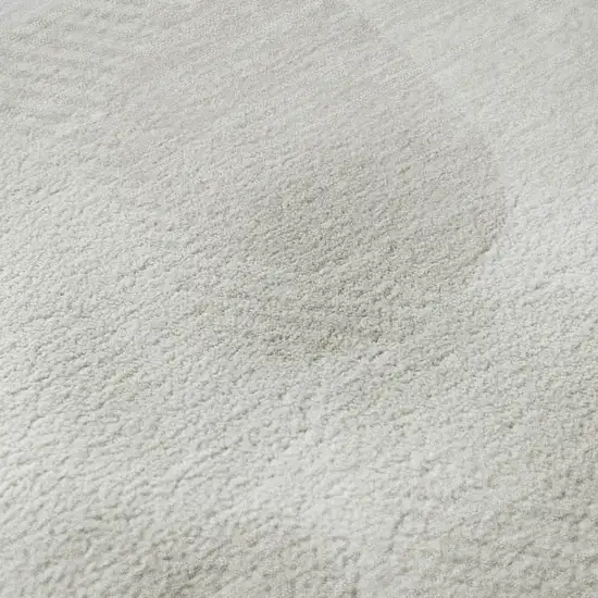 8' Ivory And Beige Abstract Geometric Washable Round Rug With UV Protection Photo 9