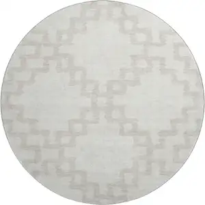 Photo of 8' Ivory And Beige Abstract Geometric Washable Round Rug With UV Protection