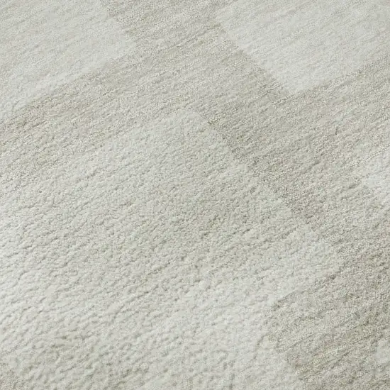 8' Ivory And Beige Abstract Geometric Washable Round Rug With UV Protection Photo 9