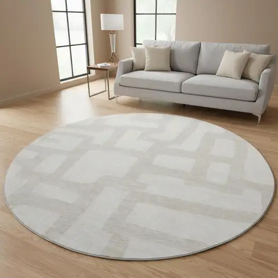 8' Ivory And Beige Abstract Geometric Washable Round Rug With UV Protection Photo 2