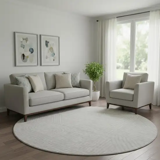 8' Ivory And Beige Abstract Geometric Washable Round Rug With UV Protection Photo 1