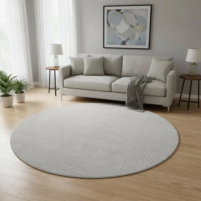 8' Ivory And Beige Abstract Geometric Washable Round Rug With UV Protection Photo 2