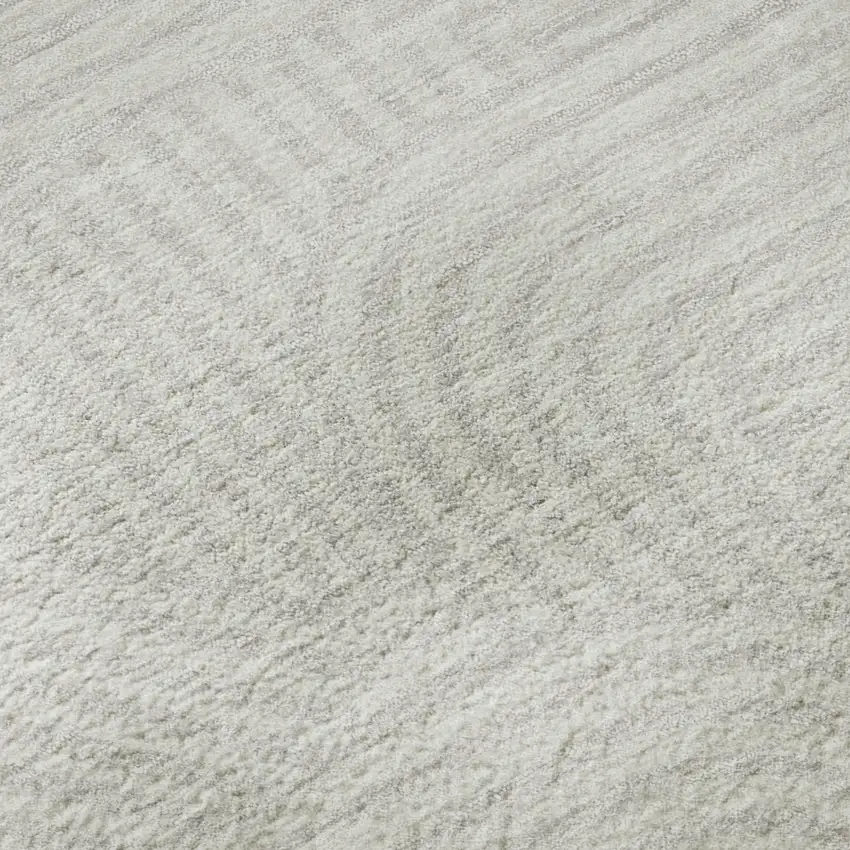 8' Ivory And Beige Abstract Geometric Washable Round Rug With UV Protection Photo 9