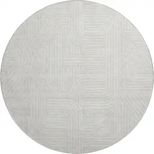 Photo of 8' Ivory And Beige Abstract Geometric Washable Round Rug With UV Protection