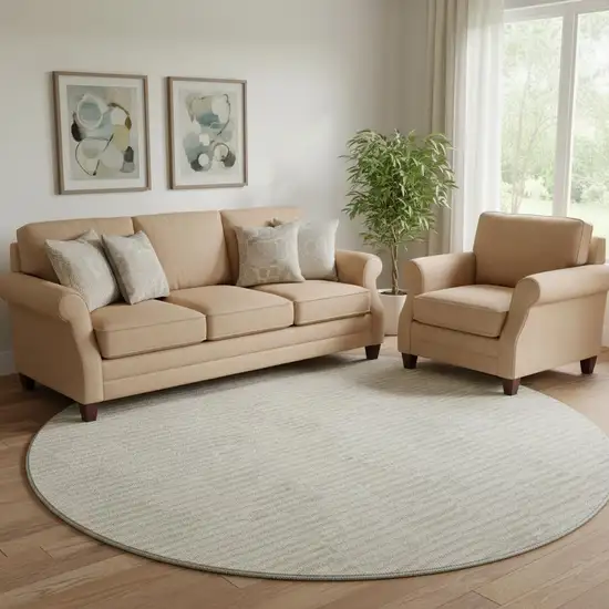 8' Ivory And Beige Abstract Geometric Washable Round Rug With UV Protection Photo 1