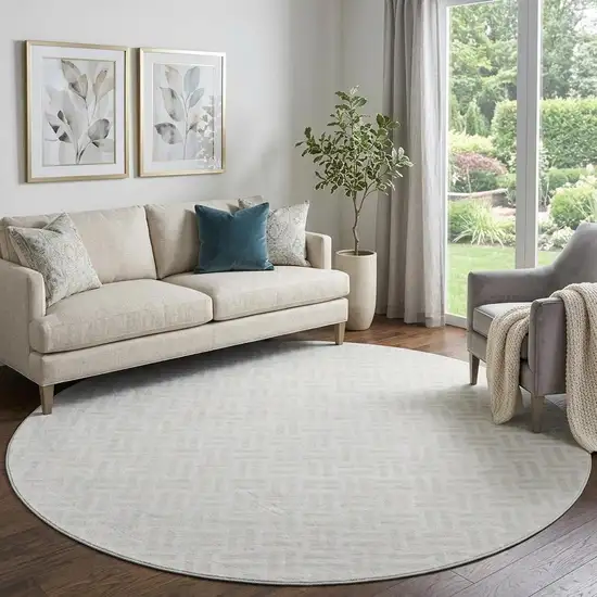 8' Ivory And Beige Abstract Geometric Washable Round Rug With UV Protection Photo 1