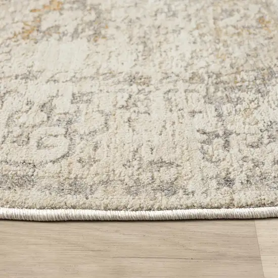 6' Ivory And Beige Abstract Round Rug Photo 3
